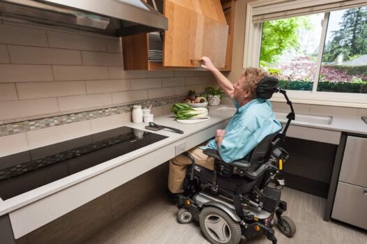 Canby ADA Kitchen Portland 019 Modern accessible design kitchen with lift up cabinets, roll-up cooktop and roll-up sink.