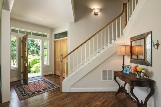 Custer Park Kitchen and 2nd Floor Addition 019 Traditional style home entryway with oak hardwood floors, staircase and open oak front door.
