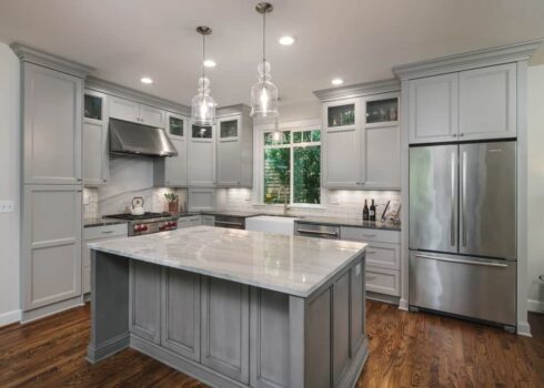 Custer Park Kitchen and 2nd Floor Addition Portland Traditional kitchen remodel with natural stone quartzite countertops, farmhouse sink, and subway tile backsplash.