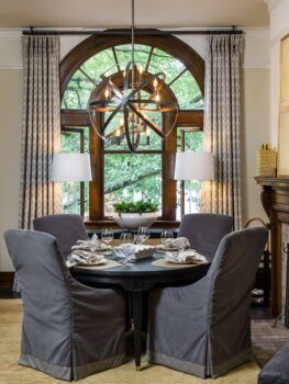 Davis Street Condo Dining Room Portland 015 Remodeled condo dining room with prepared table, chandelier, curtains, and window treatment.