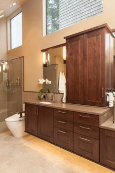 Mt Park Bathroom Portland 011 Accessibly designed bathroom with floating cabinet vanity and toe kick lighting, and fold down grab bar for toilet.