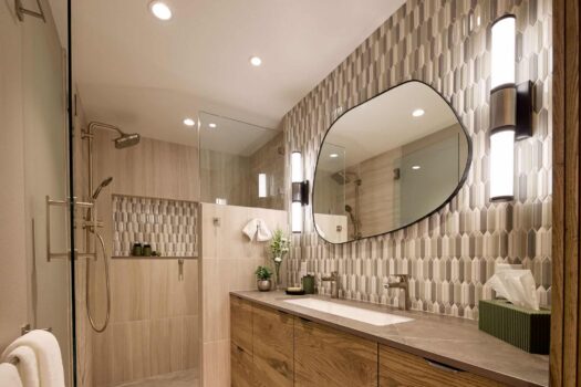bathroom remodel with tile backsplash and modern mirror