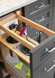 Alt text: Build in hair care and tools storage in master bedroom remodel