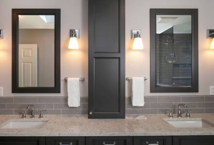 Alt text: Master bathroom with double sinks and two mirrors