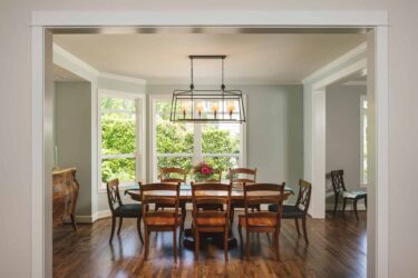 A newly spacious dining room after home addition by Neil Kelly