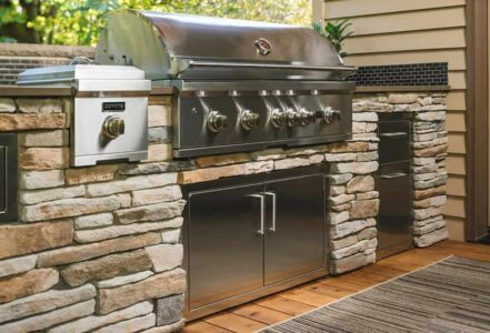 Modern appliances in Pacific Northwest aesthetic in outdoor kitchen design
