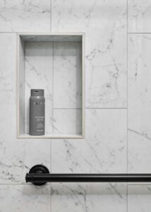 Small Transitional Bath in Northwest Portland, featuring walk-in shower with shampoo niche and safety bar.