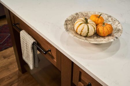 New England inspired kitchen remodel featuring quartz counters throughout.