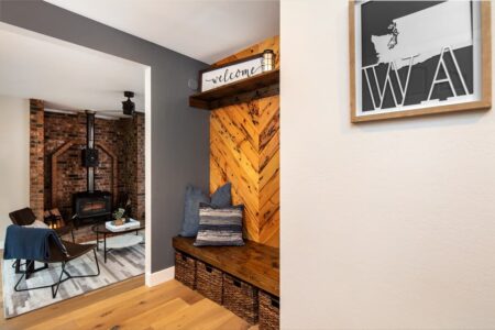 The new entry features a mudroom area with storage options for bags, coats and shoes.