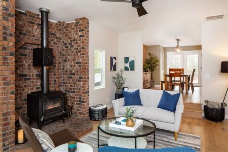 A cozy living room greets guests when they first enter the home.