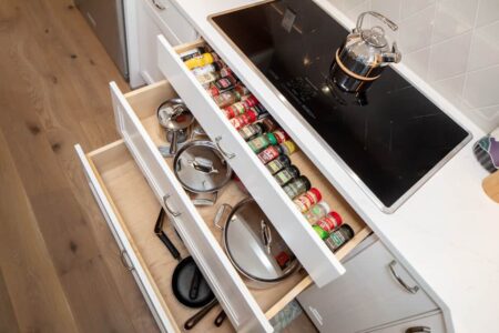 This detail of the range shows an array of storage options for busy families.