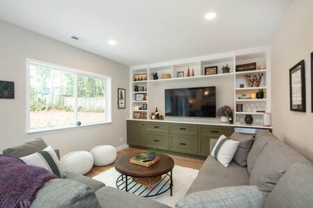 Family room adjacent to kitchen was refreshed with new cabinets and shelving.
