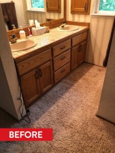 A before photo reveals 1970s-era styling in the primary bathroom.