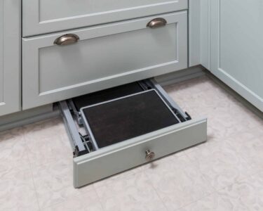 Toe-kick drawer with a collapsable step stool.