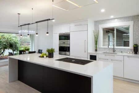 A recessed range hood saves space and adds to the clean look of the kitchen. A variety of light fixtures can be tailored to fit the mood.