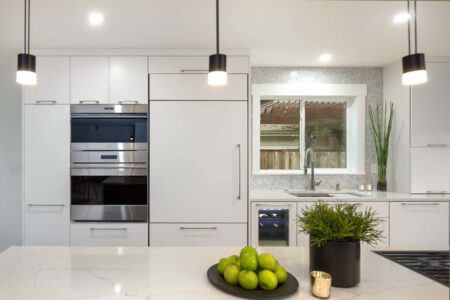 Appliances were selected to match cabinets and surfaces, creating a clean, contemporary look.