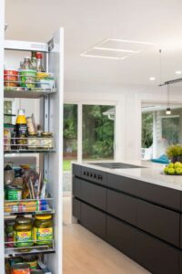 This custom pull out shows how every available space was considered for storage.