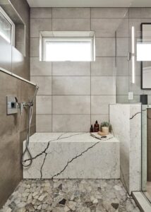 Shower bench inside a shower with PentalQuartz tile.