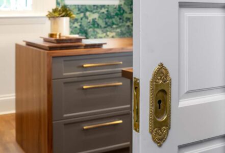 White pocket door with a brass-plated keyhole.