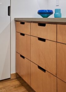 Plywood cabinet faces with maple veneer from Hayes Cabinets.