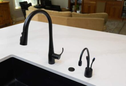 Matte black sink faucet.