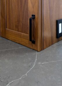 Walnut cabinet with matte black hardware.