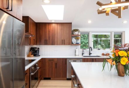 Medium-dark wood grain cabinetry from Decor Cabinets.