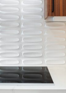 Heath Ceramics tile white dimensional backsplash.