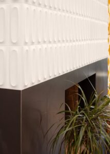 Heath Ceramics tile white dimensional backsplash.