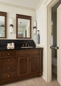 Crystal Cabinet Works custom vanity made with quarter-sawn white oak stained “Sepia”.