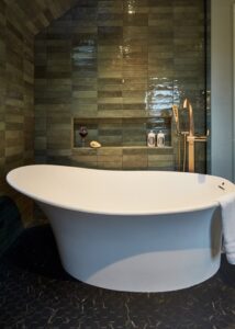 MTI Lily freestanding tub in matte white SculptureStone material.