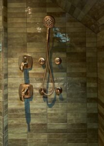 United Tile Tribeca high-gloss shower wall tile in "sage green".