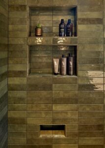 United Tile Tribeca high-gloss shower wall tile in "sage green".
