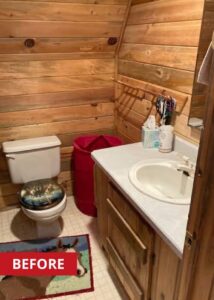 Toilet and a single-sink vanity with a white countertop and white faucet handles.