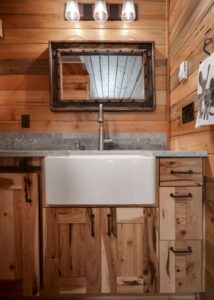 Waterworks kitchen faucet in a farmhouse sink.