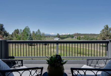 Two chairs outside on a back patio in Bend, OR.