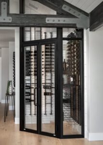 Wine room in a great room space with a commercial insulated glass enclosure.