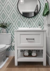 Bathroom vanity with a drawer in front and towel storage below.