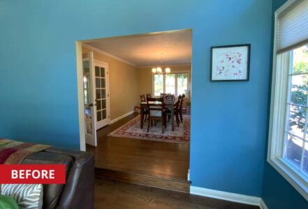 Living room archway that leads to a dining room.