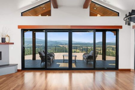 oversized sliding glass doors to outdoor living space