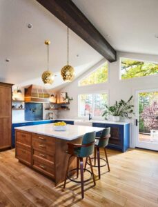 a remodeled kitchen with vaulted ceiling