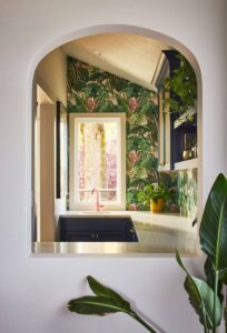 looking into the pantry through an arched opening