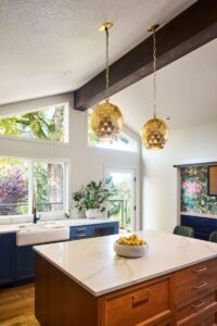 a remodeled kitchen with vaulted ceiling