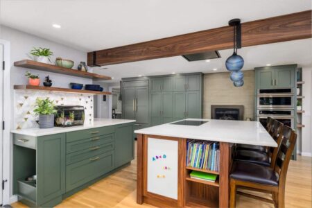 A remodeled kitchen with an activity space for small children