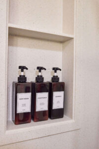 A shampoo niche in a remodeled guest bathroom in southwest Portland