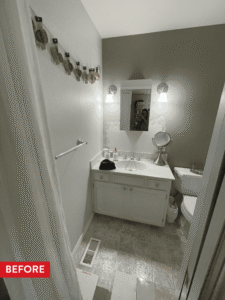 An outdated and partially repaired bathroom before remodeling