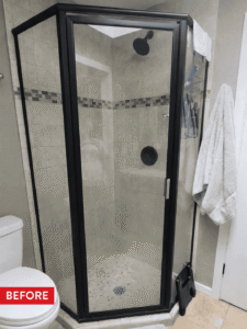 A small primary bathroom shower before remodeling