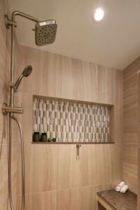 A remodeled mid-century inspired primary bathroom shower