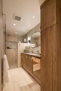 A remodeled mid-century inspired primary bathroom